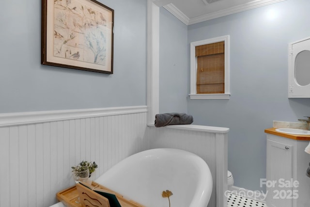 1607 Old Lawyers Rd, Marshville, NC 28103 - bathroom with vanity, crown molding, toilet, and a wainscoted wall