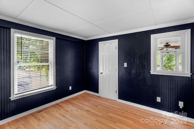 1607 Old Lawyers Rd, Marshville, NC 28103 - spare room featuring light wood-style flooring, ornamental molding, and baseboards