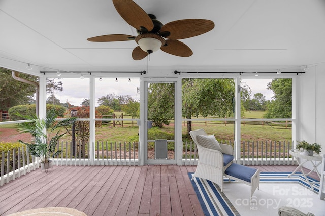 1607 Old Lawyers Rd, Marshville, NC 28103 - unfurnished sunroom featuring rail lighting and a ceiling fan