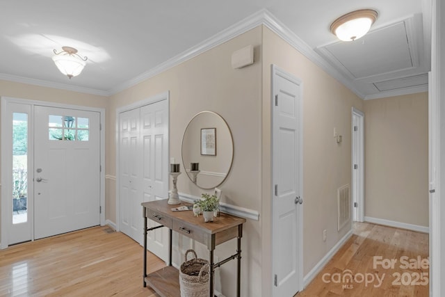 1607 Old Lawyers Rd, Marshville, NC 28103 - foyer featuring light wood-style floors, baseboards, and crown molding
