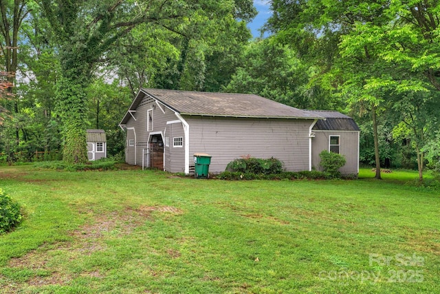 1607 Old Lawyers Rd, Marshville, NC 28103 - view of property exterior featuring a lawn and metal roof