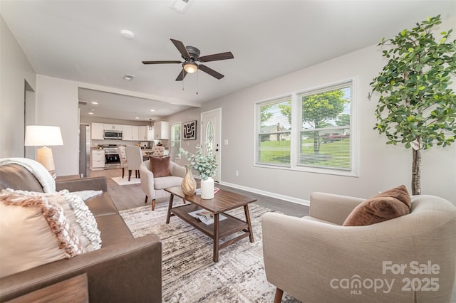 221 Belton Ave, Mount Holly, NC 28120 - living area with ceiling fan, light wood finished floors, and recessed lighting