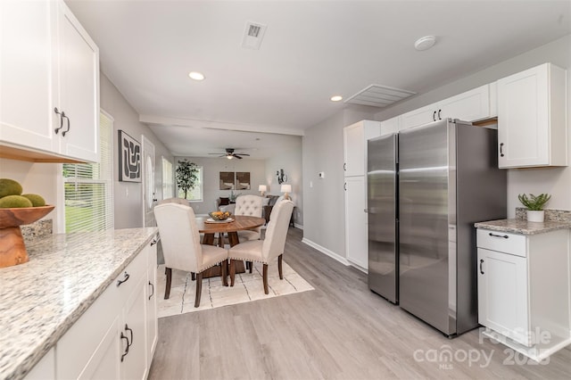 221 Belton Ave, Mount Holly, NC 28120 - kitchen featuring freestanding refrigerator, light wood-type flooring, white cabinets, recessed lighting, and ceiling fan