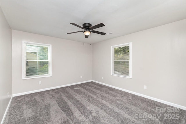 221 Belton Ave, Mount Holly, NC 28120 - spare room with ceiling fan and dark carpet