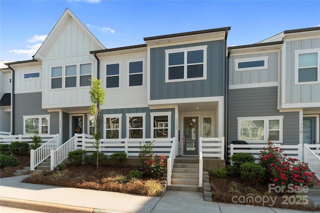 townhome / multi-family property featuring board and batten siding