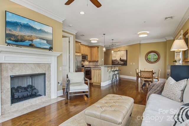 350 E Allen St Unit 201, Hendersonville, NC 28792 - living room with a ceiling fan, dark wood finished floors, crown molding, recessed lighting, and baseboards