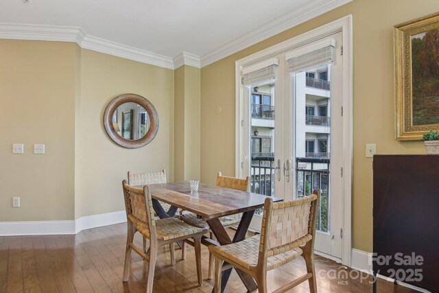 350 E Allen St Unit 201, Hendersonville, NC 28792 - dining area featuring french doors, plenty of natural light, wood-type flooring, baseboards, and ornamental molding