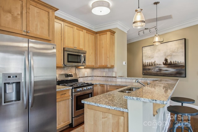 350 E Allen St Unit 201, Hendersonville, NC 28792 - kitchen with stainless steel appliances, a sink, crown molding, backsplash, and a breakfast bar