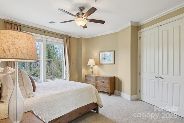 350 E Allen St Unit 201, Hendersonville, NC 28792 - carpeted bedroom featuring baseboards, ornamental molding, a closet, and ceiling fan