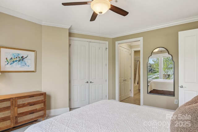 350 E Allen St Unit 201, Hendersonville, NC 28792 - bedroom with crown molding, baseboards, a ceiling fan, and a closet