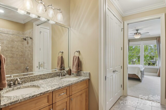 350 E Allen St Unit 201, Hendersonville, NC 28792 - ensuite bathroom featuring crown molding, double vanity, tile patterned floors, ceiling fan, and bathtub / shower combination