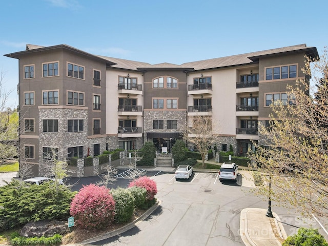 350 E Allen St Unit 201, Hendersonville, NC 28792 - view of apartment building / complex featuring uncovered parking