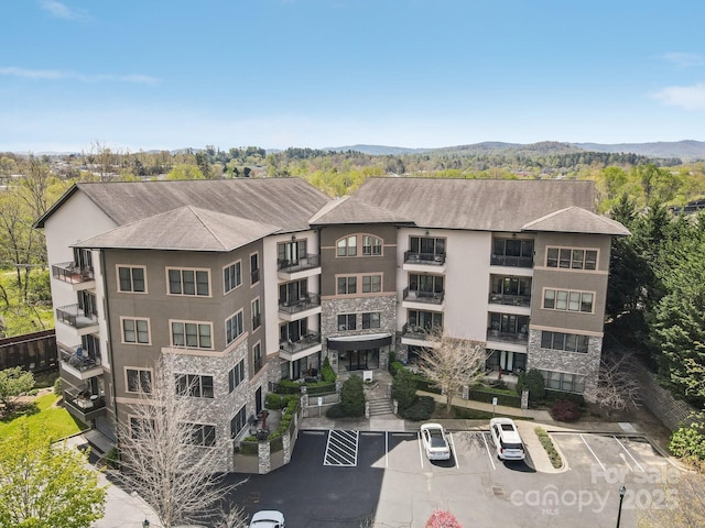 350 E Allen St Unit 201, Hendersonville, NC 28792 - view of apartment building / complex featuring uncovered parking and a mountain view