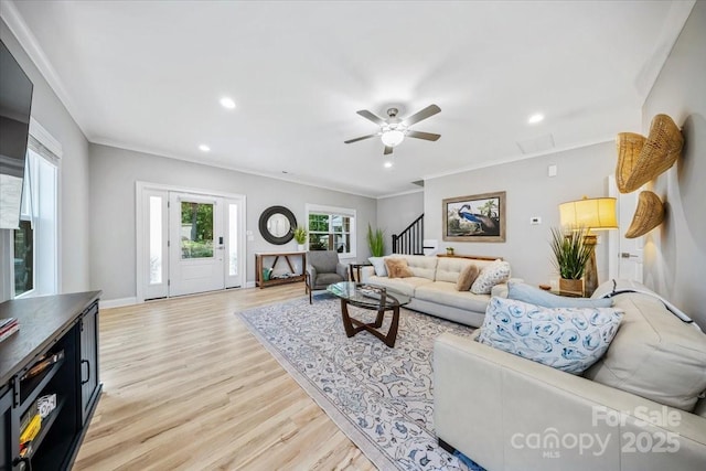 360 N Broad St, Waxhaw, NC 28173 - living room featuring crown molding, stairs, recessed lighting, a ceiling fan, and light wood finished floors