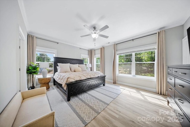 360 N Broad St, Waxhaw, NC 28173 - bedroom featuring a ceiling fan and light wood-type flooring