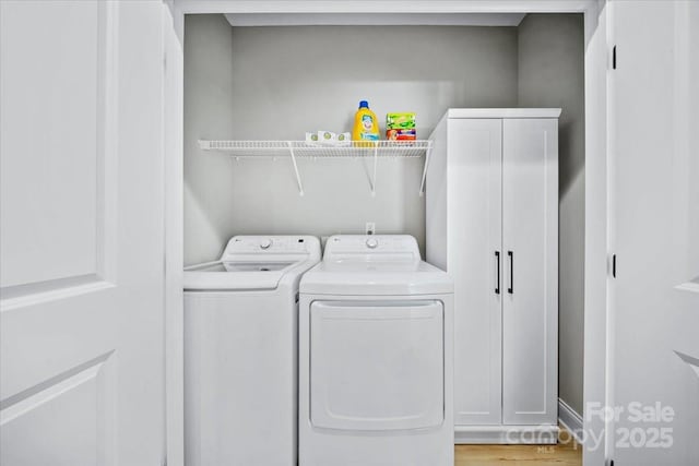 360 N Broad St, Waxhaw, NC 28173 - clothes washing area featuring separate washer and dryer and light wood-style floors