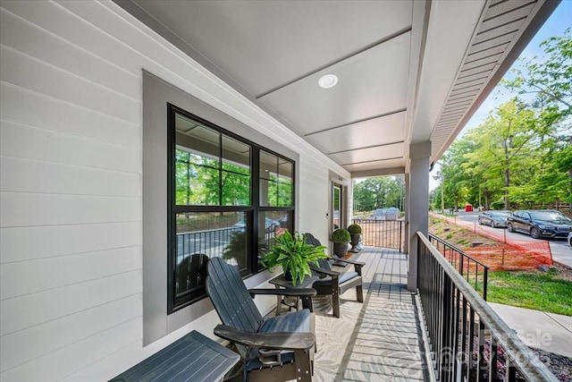 360 N Broad St, Waxhaw, NC 28173 - balcony featuring a porch