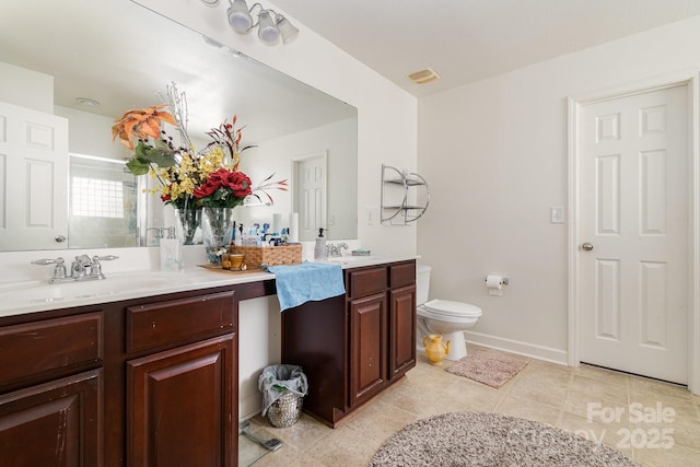 full bath featuring vanity, tile patterned flooring, a shower, toilet, and baseboards