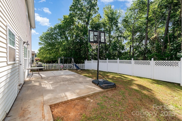 exterior space with a fenced backyard and a yard