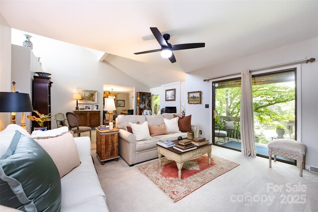 5128 Dunes Ct, Charlotte, NC 28226 - living room with light colored carpet, vaulted ceiling, and ceiling fan
