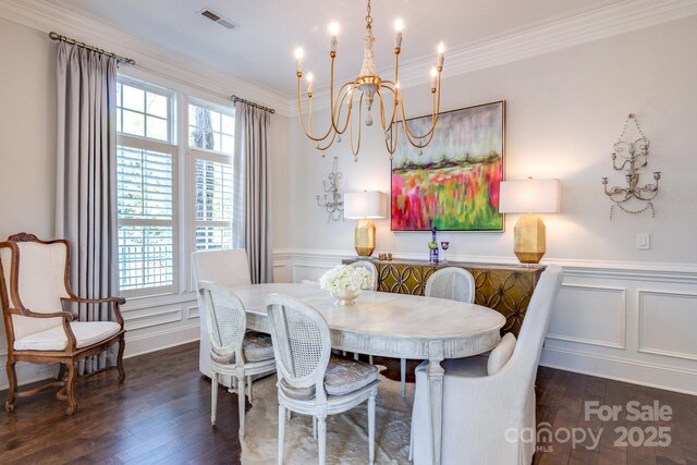 6231 Wakehurst Rd, Charlotte, NC 28226 - dining area with visible vents, an inviting chandelier, a decorative wall, and plenty of natural light
