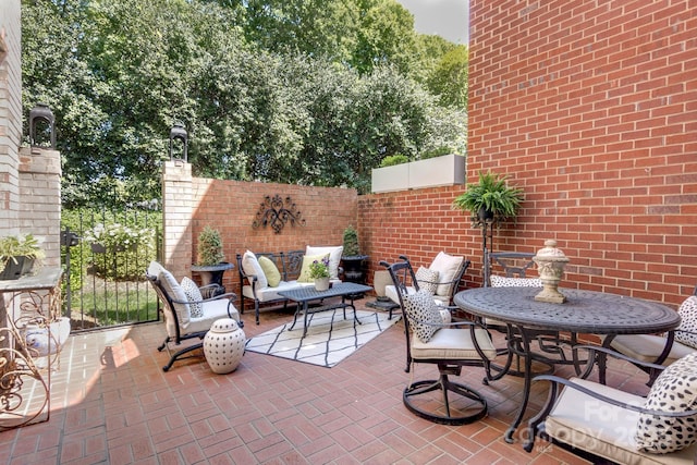 6231 Wakehurst Rd, Charlotte, NC 28226 - view of patio / terrace with an outdoor living space and fence