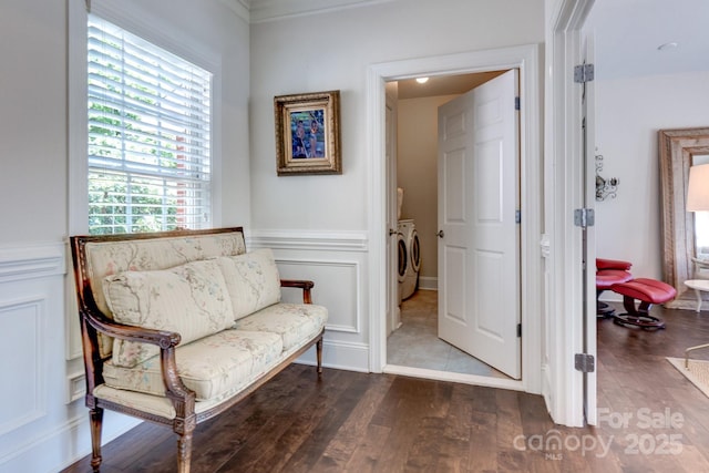 6231 Wakehurst Rd, Charlotte, NC 28226 - living area with wood finished floors, washer and clothes dryer, and wainscoting
