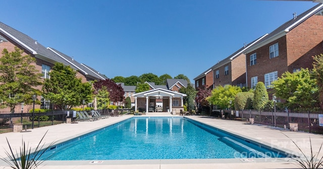 6231 Wakehurst Rd, Charlotte, NC 28226 - community pool featuring fence and a patio