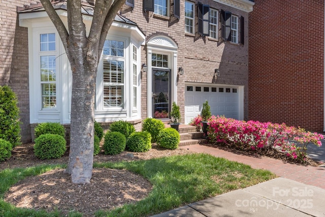 6231 Wakehurst Rd, Charlotte, NC 28226 - property entrance featuring brick siding and an attached garage