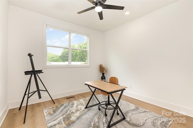 office area with recessed lighting, visible vents, a ceiling fan, light wood-type flooring, and baseboards