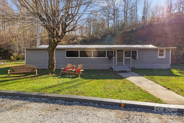 456 Newtown Rd, Rosman, NC 28772 - ranch-style house with a front lawn and metal roof