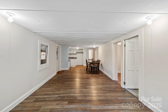 456 Newtown Rd, Rosman, NC 28772 - hallway featuring dark wood finished floors and baseboards