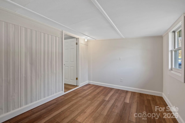 456 Newtown Rd, Rosman, NC 28772 - empty room featuring wood finished floors, baseboards, and crown molding