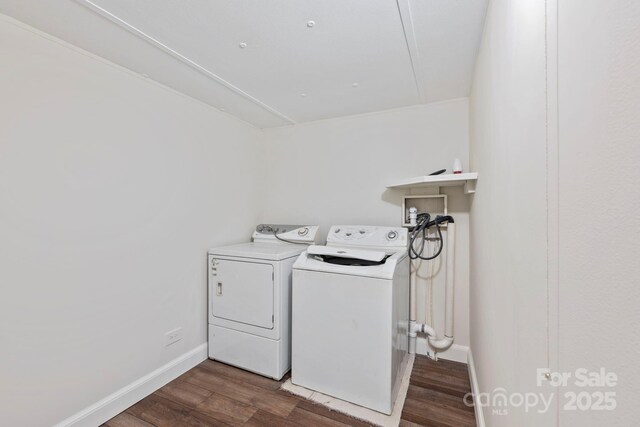 456 Newtown Rd, Rosman, NC 28772 - washroom with washer and clothes dryer, baseboards, dark wood-style flooring, and laundry area