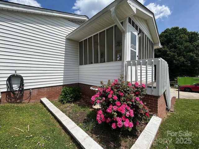 201 Mitchell St, Belmont, NC 28012 - view of home's exterior featuring a sunroom