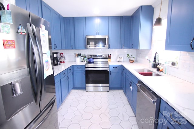 201 Mitchell St, Belmont, NC 28012 - kitchen with tasteful backsplash, a sink, blue cabinets, appliances with stainless steel finishes, and recessed lighting