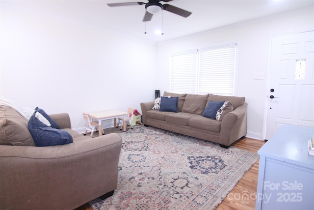 201 Mitchell St, Belmont, NC 28012 - living area with light wood-type flooring, a ceiling fan, baseboards, and ornamental molding