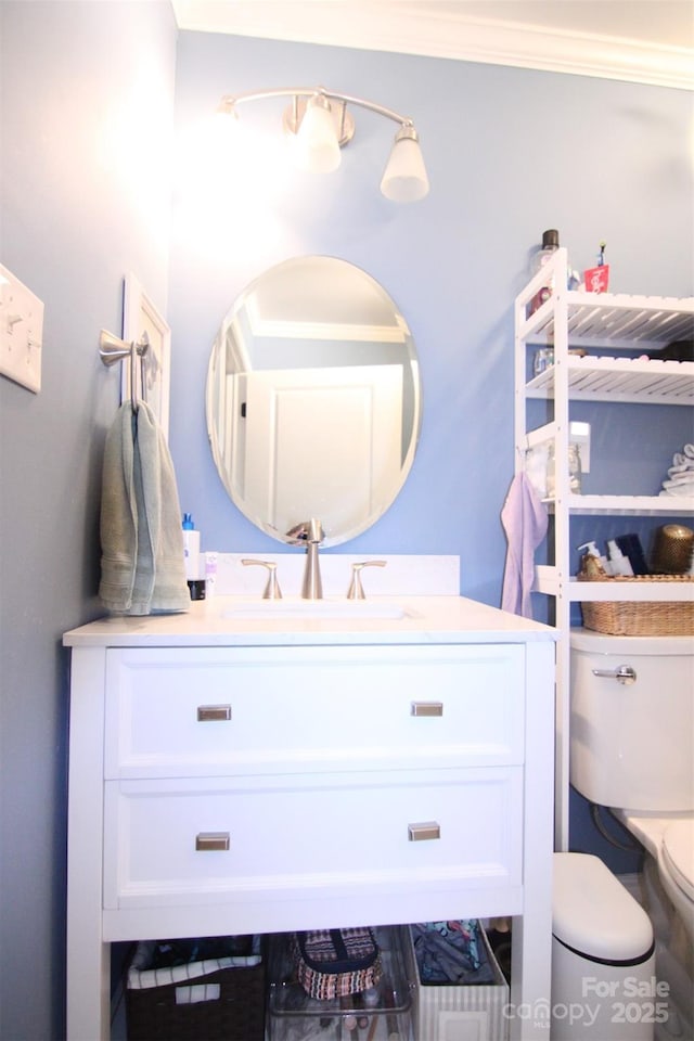 201 Mitchell St, Belmont, NC 28012 - bathroom featuring toilet, ornamental molding, and vanity