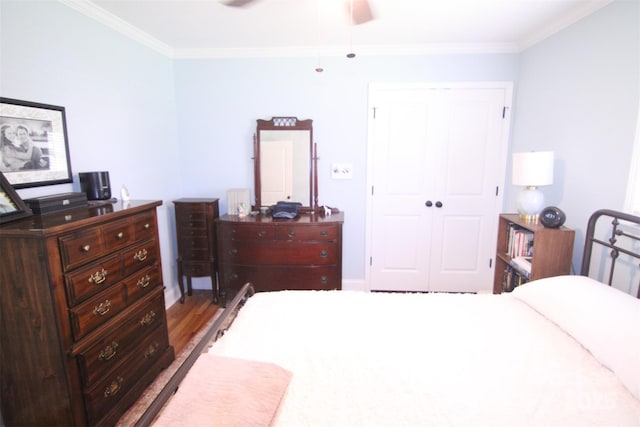 201 Mitchell St, Belmont, NC 28012 - bedroom featuring wood finished floors, a closet, ceiling fan, and crown molding