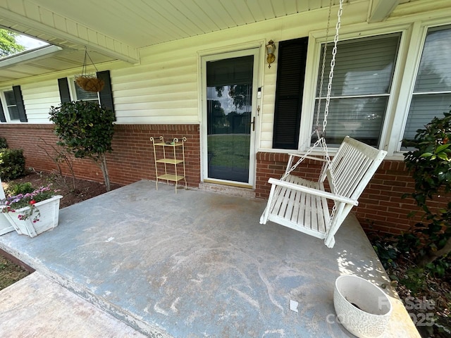 201 Mitchell St, Belmont, NC 28012 - view of patio / terrace with covered porch