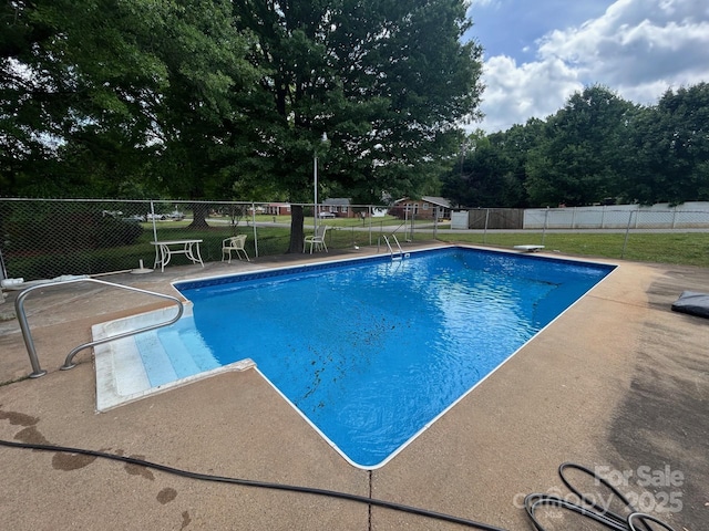 201 Mitchell St, Belmont, NC 28012 - view of swimming pool featuring fence, a patio area, and a fenced in pool