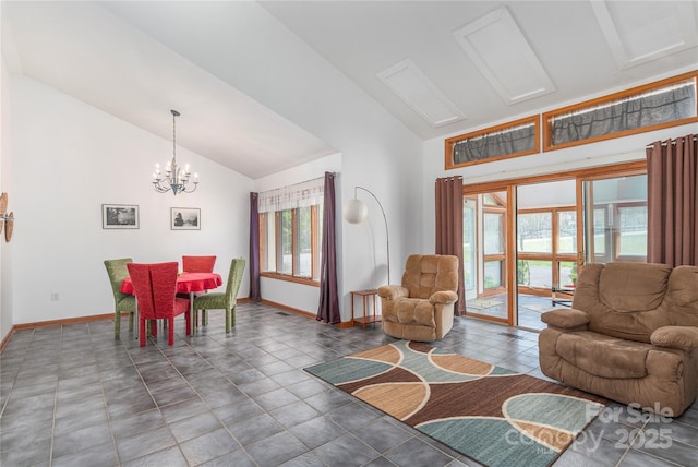 196 Timberline Dr, Maggie Valley, NC 28751 - living area featuring baseboards, high vaulted ceiling, a chandelier, and a healthy amount of sunlight