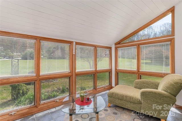 196 Timberline Dr, Maggie Valley, NC 28751 - sunroom with tile patterned floors, lofted ceiling, and a healthy amount of sunlight