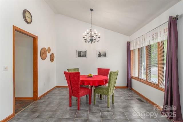 196 Timberline Dr, Maggie Valley, NC 28751 - dining room with an inviting chandelier, visible vents, vaulted ceiling, and baseboards