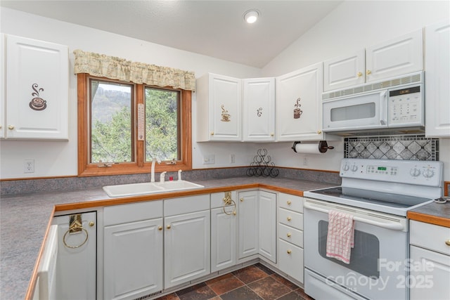 196 Timberline Dr, Maggie Valley, NC 28751 - kitchen featuring lofted ceiling, white cabinets, a sink, recessed lighting, and white appliances