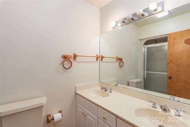 196 Timberline Dr, Maggie Valley, NC 28751 - bathroom with a shower stall, toilet, double vanity, and a sink