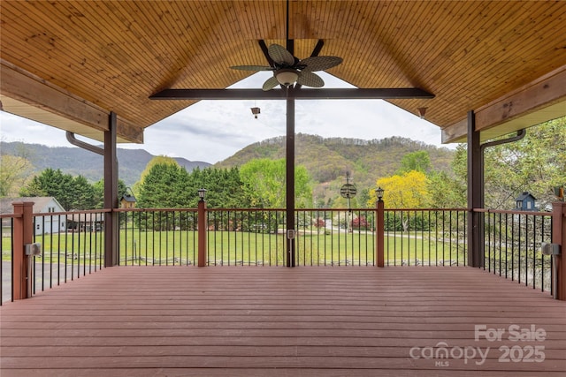 196 Timberline Dr, Maggie Valley, NC 28751 - wooden terrace featuring a lawn, a ceiling fan, and a mountain view