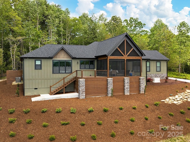 636 Crystal Heights Dr, Hendersonville, NC 28739 - view of front of house featuring board and batten siding, stairway, a sunroom, crawl space, and a shingled roof