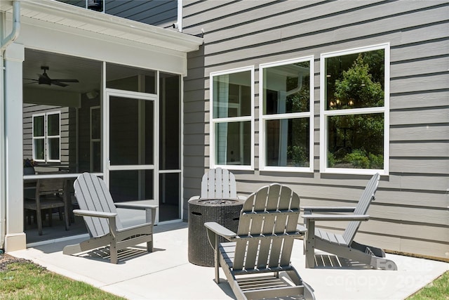 424 Balboa St, Matthews, NC 28104 - view of patio featuring a ceiling fan and a sunroom