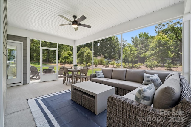 424 Balboa St, Matthews, NC 28104 - sunroom / solarium featuring outdoor lounge area, ceiling fan, outdoor dining area, and plenty of natural light